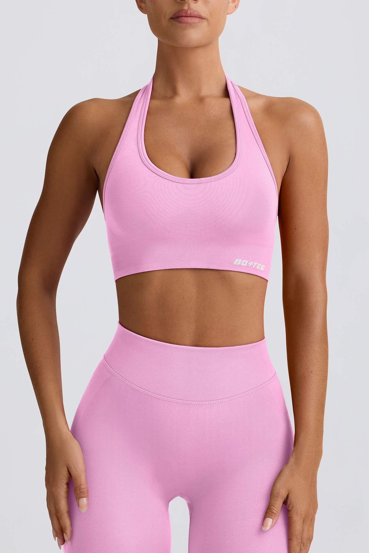 Define Luxe Halterneck Sports Bra In Bubblegum Pink